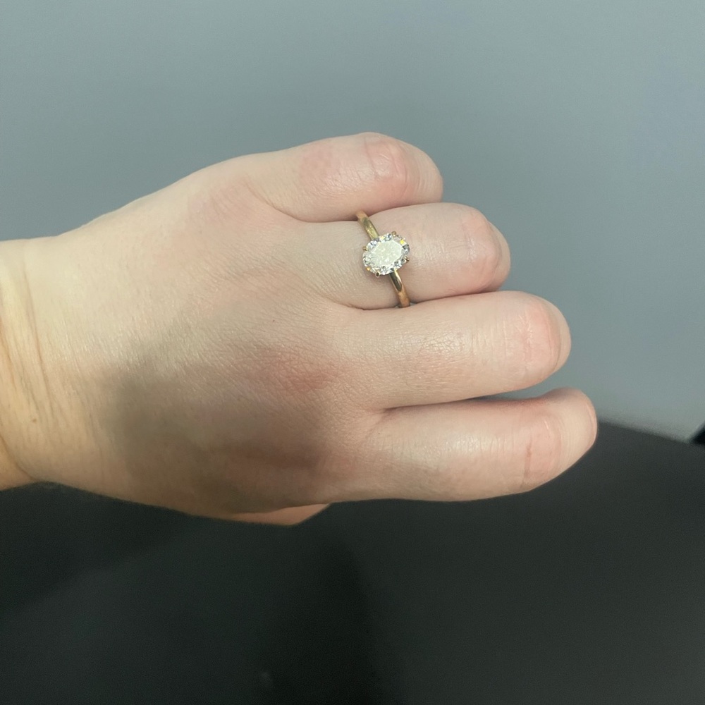 Elegant 10k Gold and Crushed Ice Oval Moissanite Ring